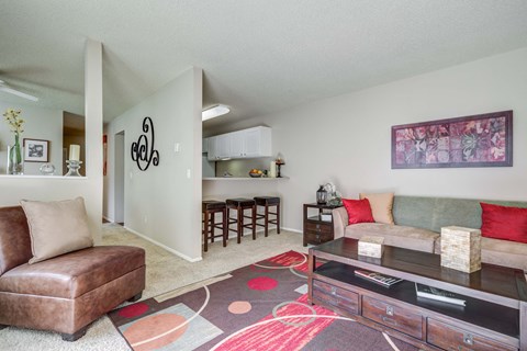 a living room with a couch and a table